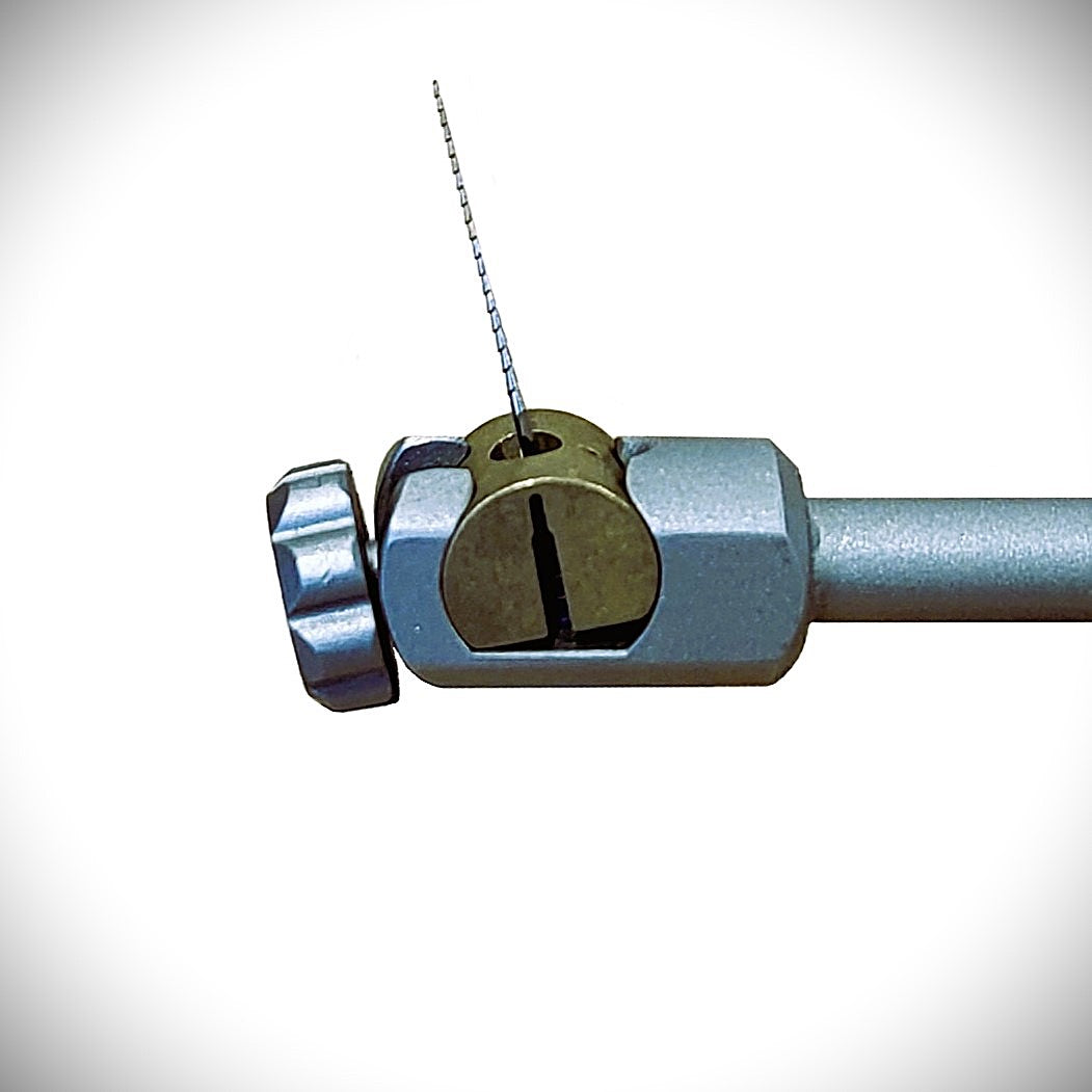 ALPHA -  adjustable-angle flushing endo file holder